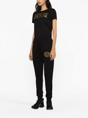 Sportovní kalhoty s potiskem Versace Jeans Couture černé