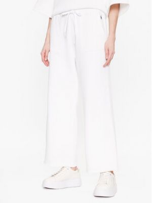 Priliehavé teplákové nohavice Polo Ralph Lauren biela