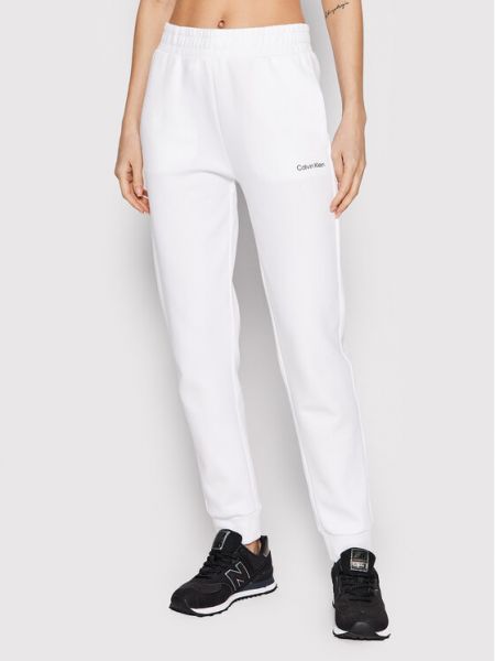 Sportovní kalhoty Calvin Klein bílé