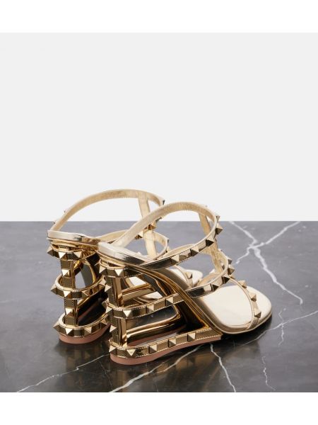 Kožené sandále na kline Valentino Garavani zlatá