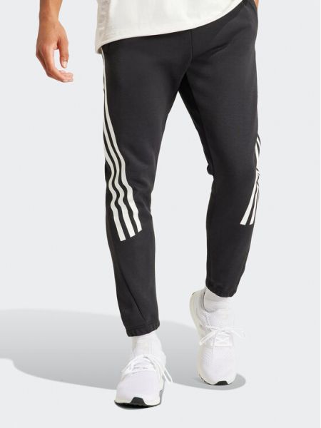 Pruhované slim fit priliehavé teplákové nohavice Adidas čierna