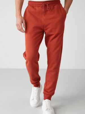 Спортни панталони Grimelange оранжево