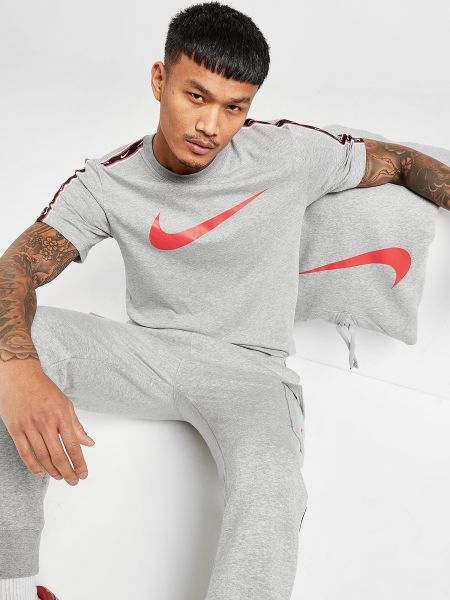 Nyomott mintás póló Nike - Karmazsinvörös
