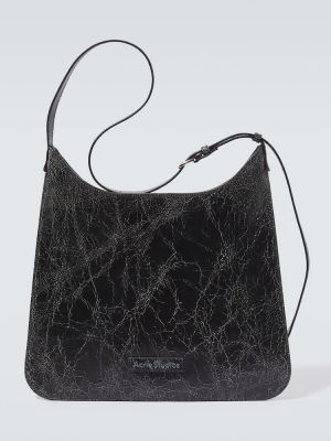 Kožená taška přes rameno s oděrkami Acne Studios černá