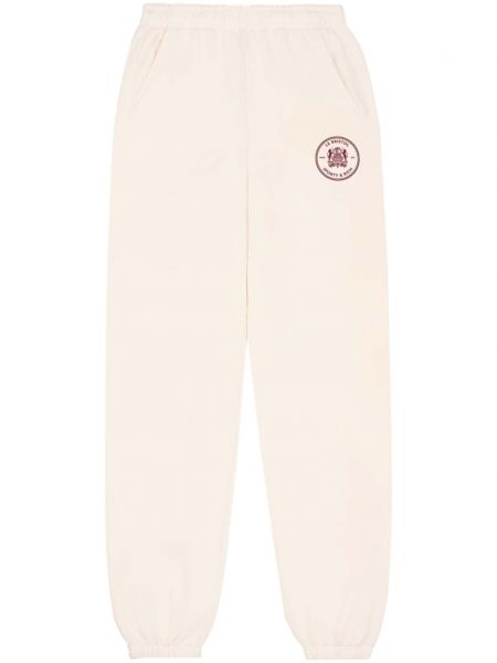Bavlnené teplákové nohavice Sporty & Rich biela