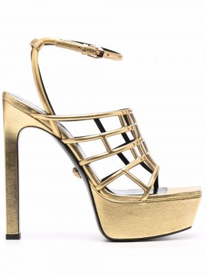 Złote sandały Versace