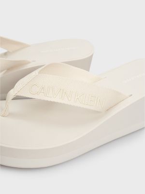 Білі в'єтнамки на танкетці Calvin Klein Jeans