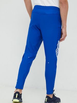 Běžecké kalhoty s potiskem Adidas Performance modré