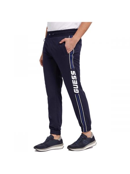 Spodnie sportowe Guess niebieskie