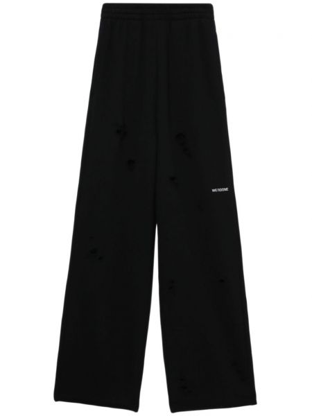 Bavlněné sportovní kalhoty s výšivkou We11done černé