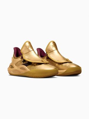 Sneakersy w gwiazdy Converse złote