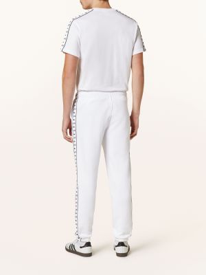 Sportovní kalhoty Lacoste bílé