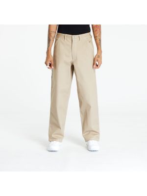 Bavlněné džíny Nike khaki