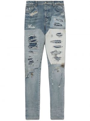 Distressed skinny jeans mit print Amiri