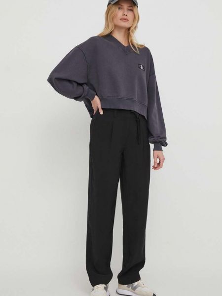 Bluza bawełniana z dekoltem w serek oversize Calvin Klein Jeans