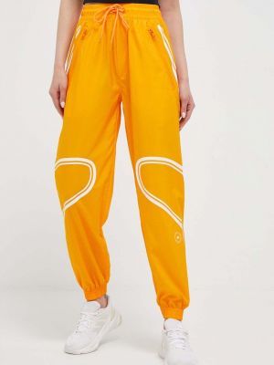 Spodnie sportowe z nadrukiem Adidas By Stella Mccartney pomarańczowe