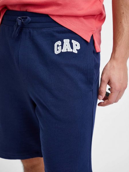 Priliehavé športové šortky Gap modrá