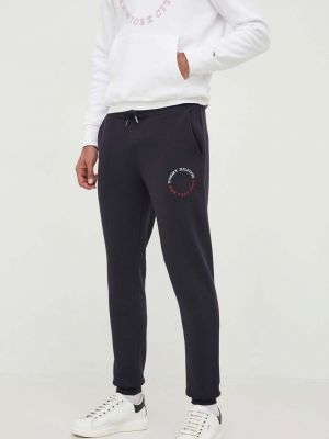 Sportovní kalhoty s potiskem Tommy Hilfiger béžové