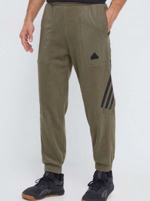Sportovní kalhoty s potiskem Adidas zelené