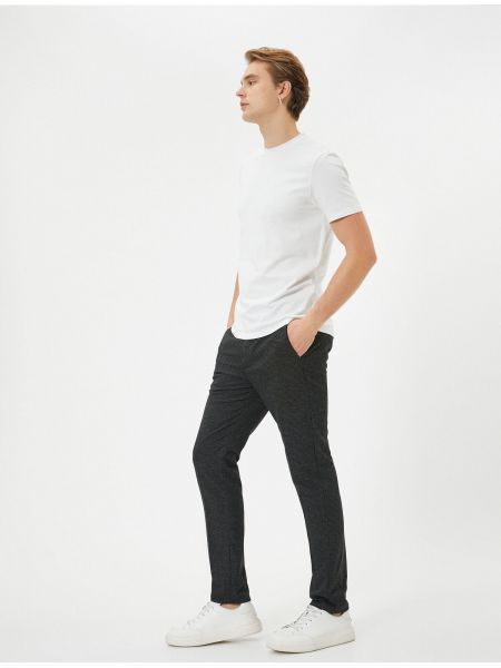 Slim fit kalhoty s knoflíky s kapsami Koton