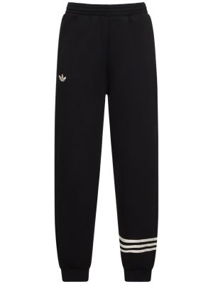 Памучни панталони jogger на райета Adidas Originals черно