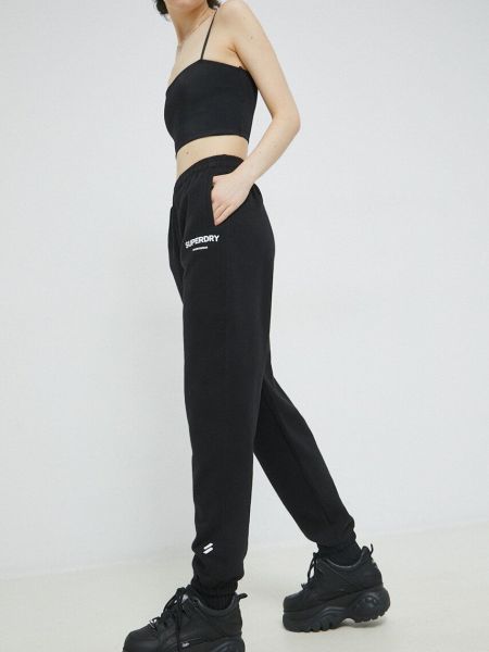 Superdry pantaloni de trening din bumbac culoarea negru, cu imprimeu
