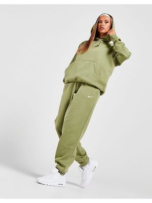 Teplákové nohavice Nike - zelená