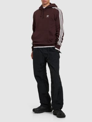 Bombažna jopa s kapuco s črtami Adidas Originals