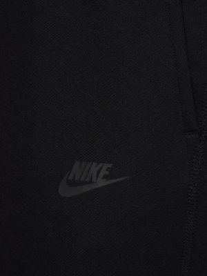 Slim fit fleecové sportovní kalhoty Nike černé