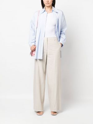 Pletené kalhoty relaxed fit Calvin Klein béžové