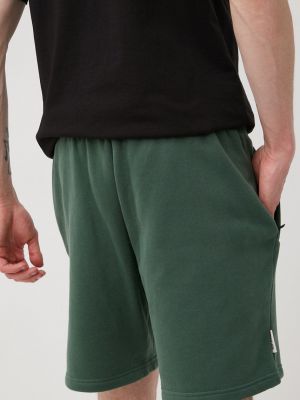 Pantaloni din bumbac Unfair Athletics verde