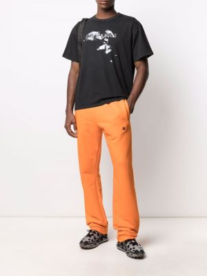 Běžecké kalhoty s výšivkou Misbhv oranžové