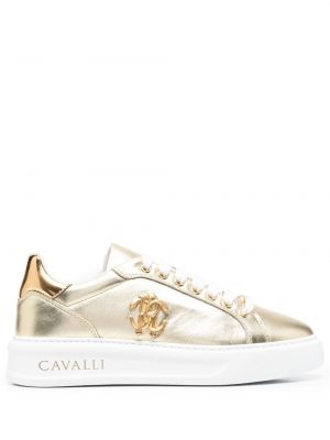 Sneakersy w wężowy wzór Roberto Cavalli złote