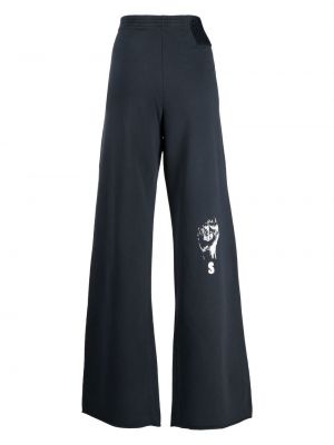 Spodnie sportowe z nadrukiem Raf Simons niebieskie