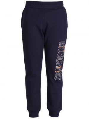 Pantaloni sport din bumbac cu imagine Moschino albastru