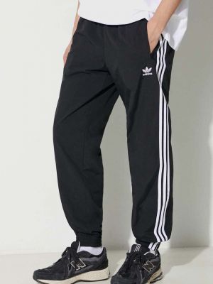 Pletene hlače s printom Adidas Originals crna