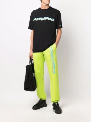 Pantalon de joggings à imprimé Moschino vert