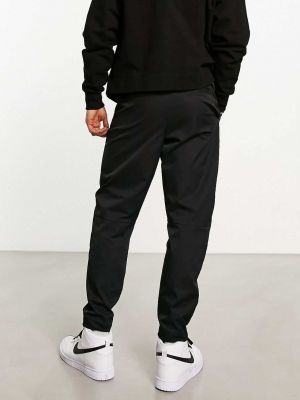 Плетеные брюки слим Nike черные