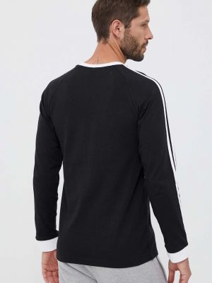 Pruhované bavlněné tričko s dlouhým rukávem s dlouhými rukávy Adidas Originals černé