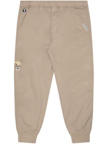 Pantalon en coton avec applique Aape By *a Bathing Ape® beige