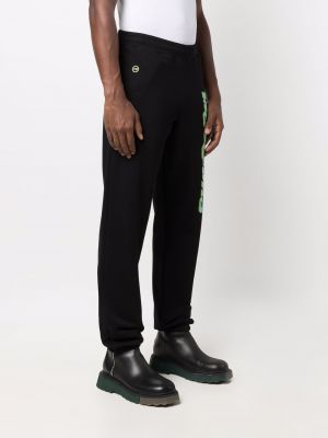 Sportovní kalhoty s potiskem Moschino černé