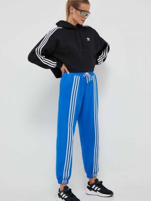 Bavlněné sportovní kalhoty s aplikacemi Adidas Originals modré