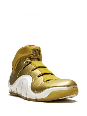 Sneakersy w gwiazdy Nike Zoom złote