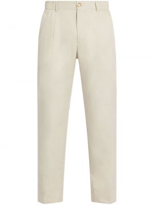 Pantaloni chino plisate Ché alb