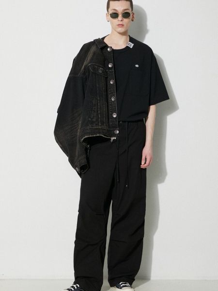 Jednobarevné bavlněné kalhoty Maison Mihara Yasuhiro černé