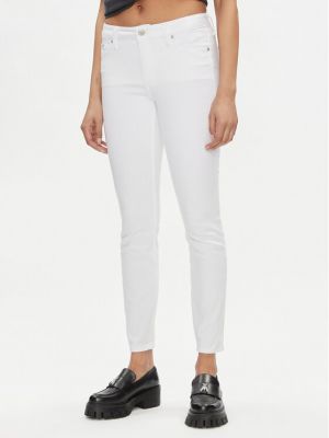 Priliehavé skinny fit džínsy Calvin Klein Jeans biela