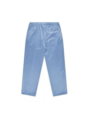 Spodnie sportowe relaxed fit Stussy niebieskie