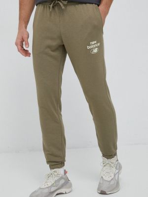 Spodnie sportowe z nadrukiem New Balance zielone