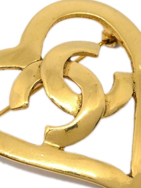 Broša ar zelta pārklājumu ar sirsniņām Chanel Pre-owned zelts
