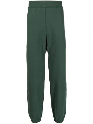 Pantaloni din bumbac cu imagine Suicoke verde